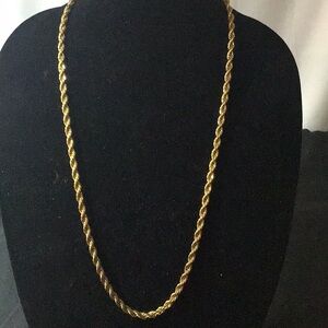 316 stainless steel gold colored rope chain. It is 30” long & 7mm thick.